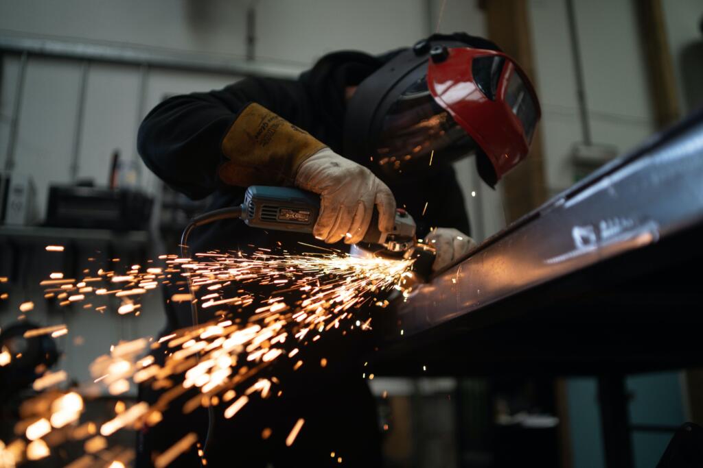 Man welding with gloves